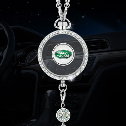 Autó aromaterápiás logós medál fémből és gyémántokból