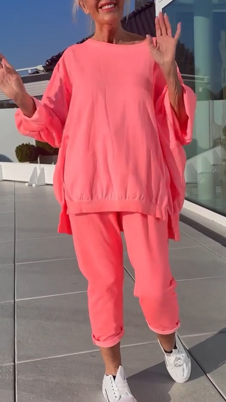 Nyári női kerek nyakú, hasított, világos színű, lezser kosztüm