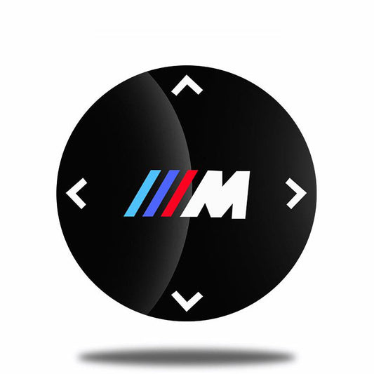Dekoratív matrica a BMW multimédia gombhoz
