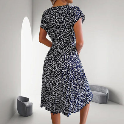 🎁2025-ös nyári kiárusítás🎁 Virágos, rövid ujjú, hajtogatott női ruha👗 (6 színben, zsebekkel)