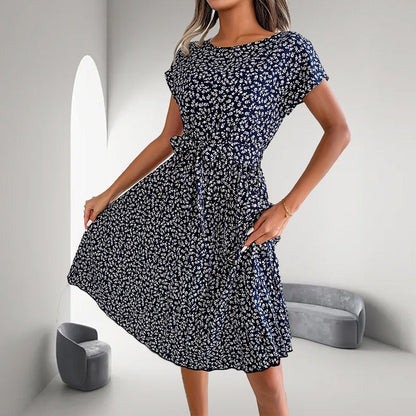 🎁2025-ös nyári kiárusítás🎁 Virágos, rövid ujjú, hajtogatott női ruha👗 (6 színben, zsebekkel)