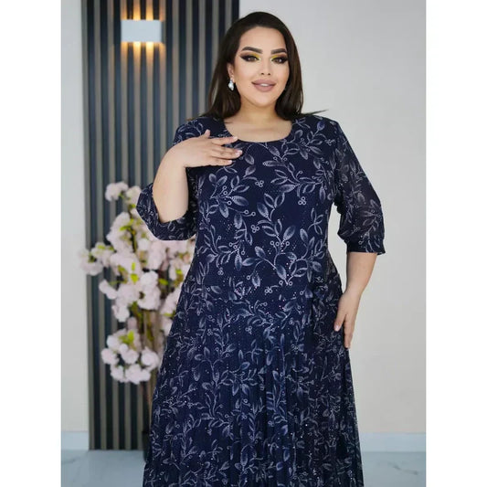 Kerek nyakú, 3/4-es ujjú, mintás maxi ruha