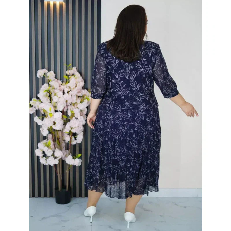 Kerek nyakú, 3/4-es ujjú, mintás maxi ruha